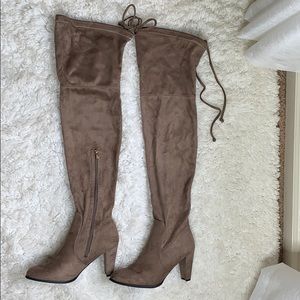Thigh high tan suede heeled boots